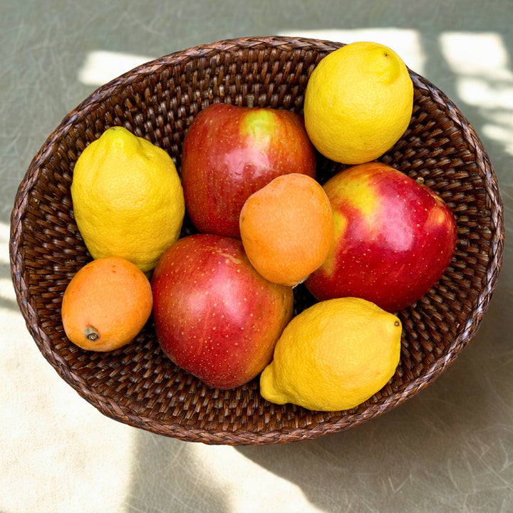 Brotkorb Rattan oval mit obst gefüllt